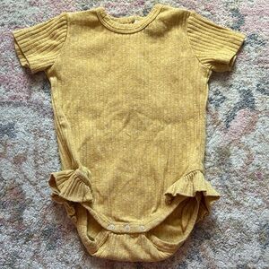 Kate Quinn ruffled leg bodysuit